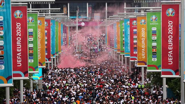 Fans make their way into Wembley Stadium in London for the European Championship Final. (Photo by Alex Pantling/Getty Images)