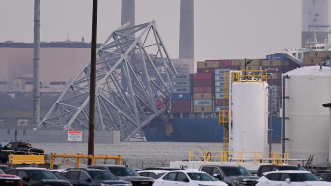 Part of the steel frame of the Francis Scott Key Bridge sits on top of the container ship Dali after the bridge collapsed in Baltimore, Maryland. Picture: Roberto Schmidt/AFP