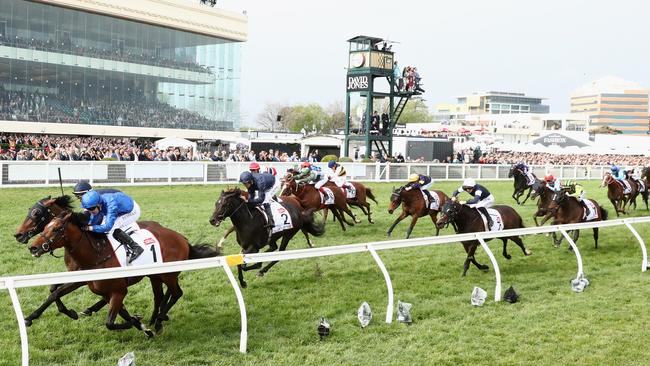 Pat Gosgrave and Best Solution (rails) dig in the fight to the line. Picture: Getty Images