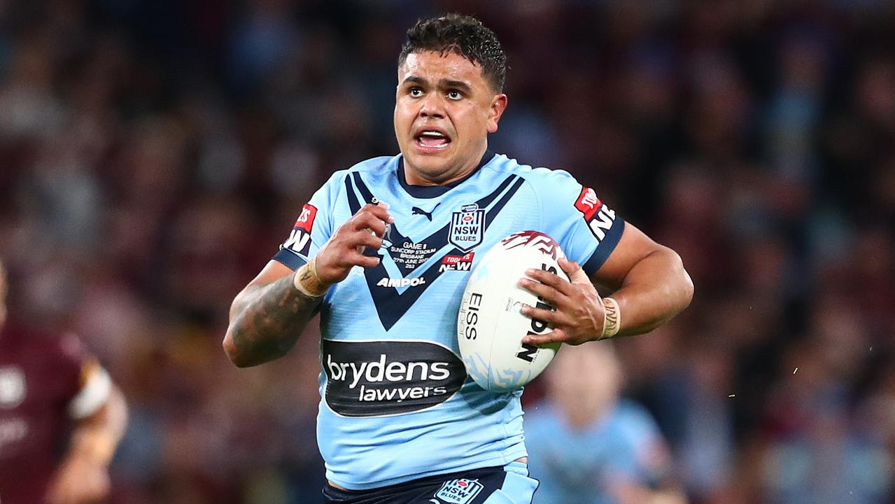 BRISBANE, AUSTRALIA – JUNE 27: Latrell Mitchell of the Blues makes a break to score a try during game two of the 2021 State of Origin series between the Queensland Maroons and the New South Wales Blues at Suncorp Stadium on June 27, 2021 in Brisbane, Australia. (Photo by Chris Hyde/Getty Images)