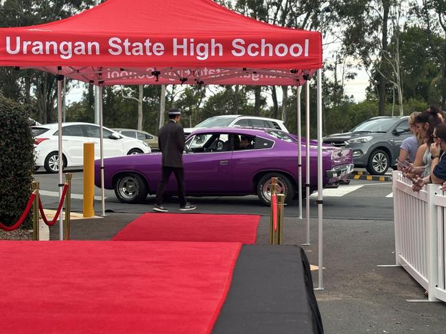 The students of Urangan State High School arriving at their formal.