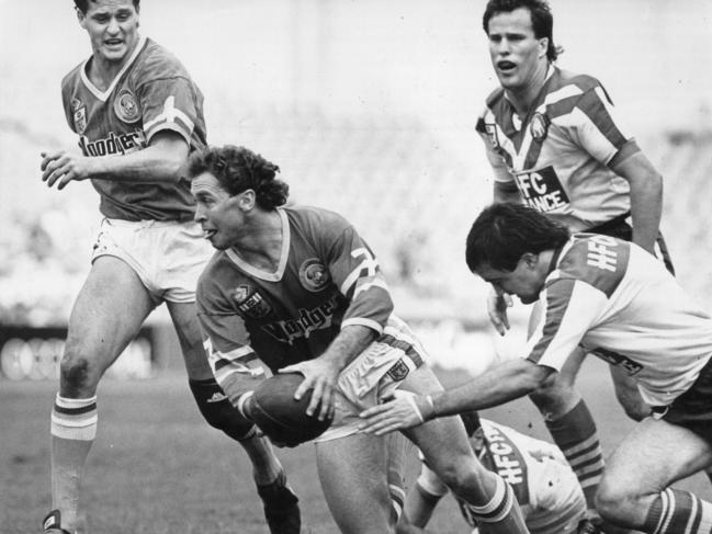 Ricky Stuart in action on the field.