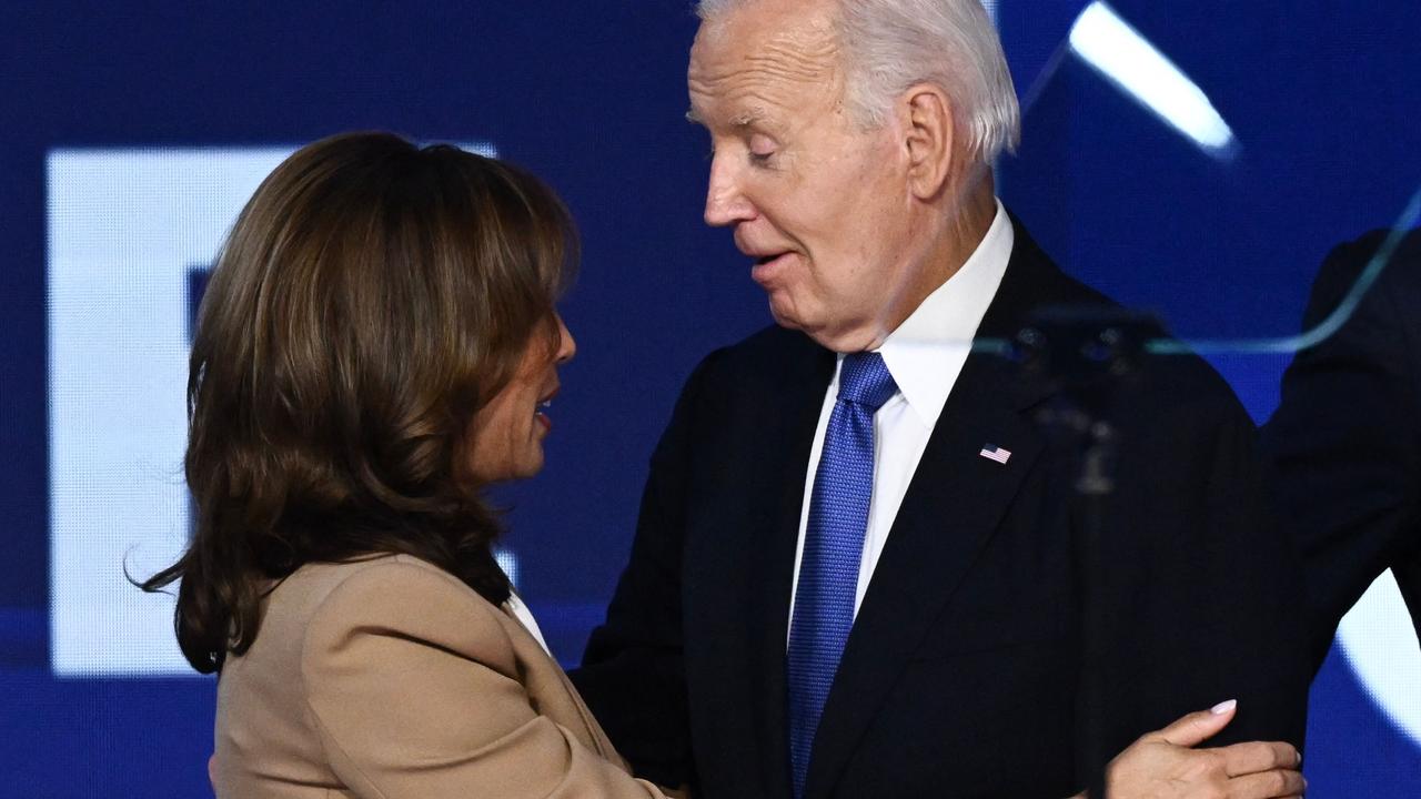 The President and Vice President share a word. Picture: Mandel Ngan/AFP