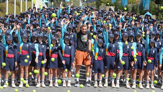 This year’s Australian Open ballkids, pictured with Denis Shapovalov, won’t get paid for their work. Picture: David Crosling