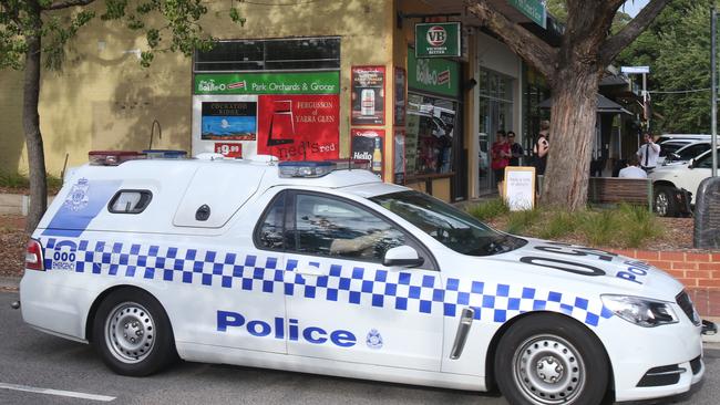 Police at the scene of the shooting the next day Picture: AAP/David Crosling