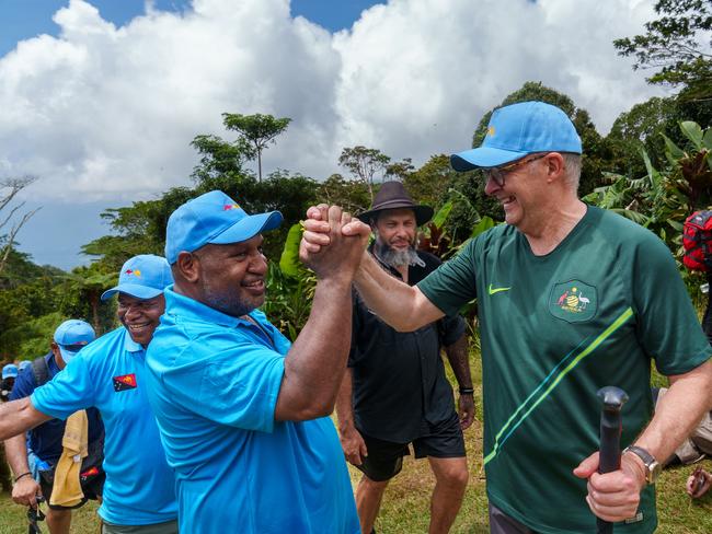 PAPUA NEW GUINEA: Newswire Photos: APRIL 24 2024: Australia's Prime Minister Anthony Albanese and Papua New Guinea Prime Minister James Marape walk along the Kokoda Track at Kokoda Village in Papua New Guinea on April 24, 2024. Prime Minister Anthony Albanese slips over. Picture: NCA NewsWire via the Australian Prime Ministers Office