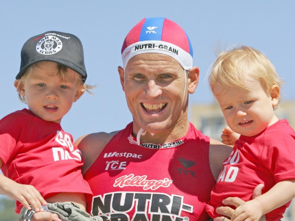 Dean Mercer with two of his kids. Photo: Harvie Allison