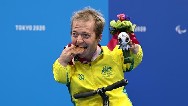 Grant Patterson celebrates his bronze medal win in the men’s 150m Individual Medley at the Tokyo 2021 Paralympic Games. (Photo by Buda Mendes/Getty Images)