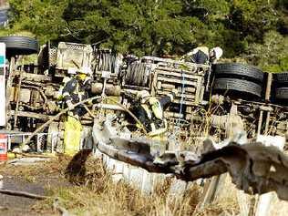 Crash scene: Fire and rescue personnel take control of the scene after a fuel tanker carrying petrol and diesel crashed on the Bruxner Highway south of Lismore on June 14, spilling 15,000 litres of fuel. . Picture: Jerad Williams