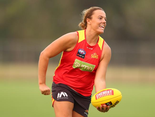 GOLD COAST, AUSTRALIA - DECEMBER 16: Molly Ritson handballs during a Gold Coast Suns AFLW training session on December 16, 2019 in Gold Coast, Australia. (Photo by Chris Hyde/AFL Photos/Getty Images)