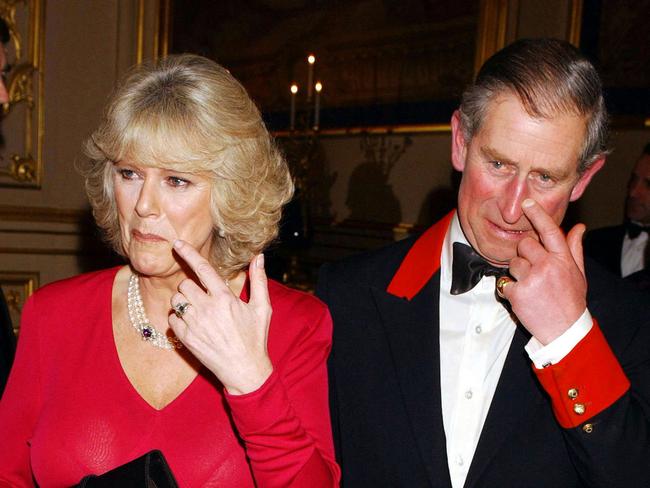 The then Prince Charles and Camilla Parker Bowles arrive for a party at Windsor Castle in February 2005 after announcing their engagement AFP