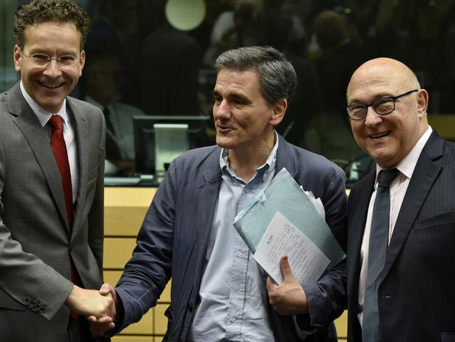 Embarrassing ... Newly appointed Greek Finance Minister Euclid Tsakalotos showed up to the European leaders summit with a few bullet point notes he had jotted down on the bedside notepad from his hotel. Picture: AFP/JOHN THYS