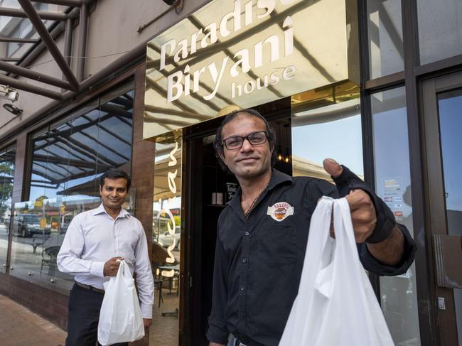 NORTHERN DISTRICT TIMES. Paradise Biryani House. His restaurant only opened two months ago and he has already had to let go six staff bc of the new social distancing rules. Yet he has offered to give out free lunches to the elderly and disabled and Ryde hospital nurses. Delivery drivers also pick up groceries for  the vulnerable group along the way. The owners Raja Pokala (L) and  Suren Gadheraju (R), photographed today 27th March 2020. (AAP/Image Matthew Vasilescu)