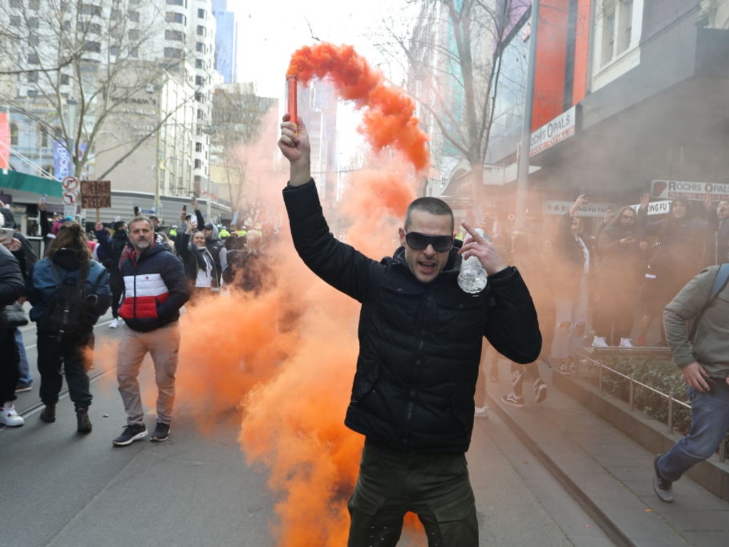 Protesters take to the streets during a Freedom rally on July 24, 2021 in Melbourne, Australia. Picture: Diego Fedele/Getty Images.