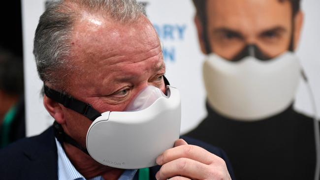 Franck Glaizal, chief executive officer and co-founder, demonstrates the AIRXOM mask for active protection from the effects of air pollution, bacteria, and viruses including Covid-19 during CES. Picture: AFP