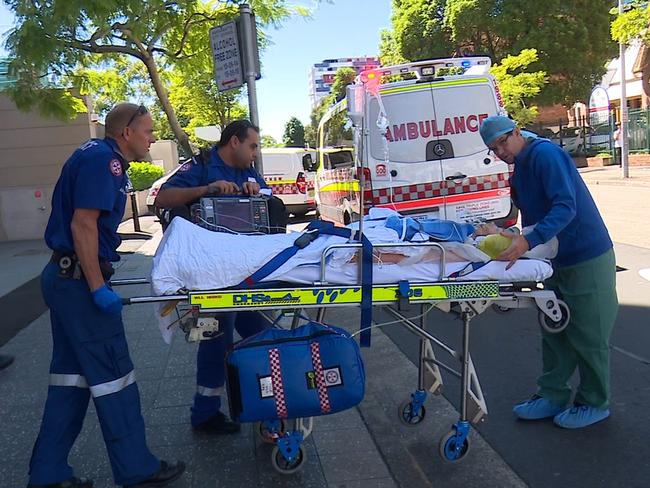 Amy Lee Rickhuss is taken from BCI to Westmead Hospital after suffering a cardiac arrest during a breast enhancement surgery. Picture: Dean Asher/Top Notch Video