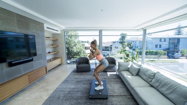 She now trains for about an hour a day including doing two HITT sessions a week and using her Virtuvium Form weights machine, but emphasised the importance of listening to your body. Picture: Instagram/AmandaBisk