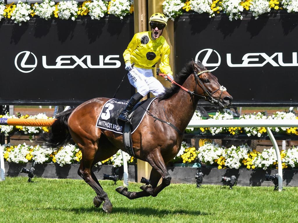 Mark Zahra celebrates after winning the Melbourne Cup on Without A Fight. Picture: Pat Scala/Racing Photos via Getty Images