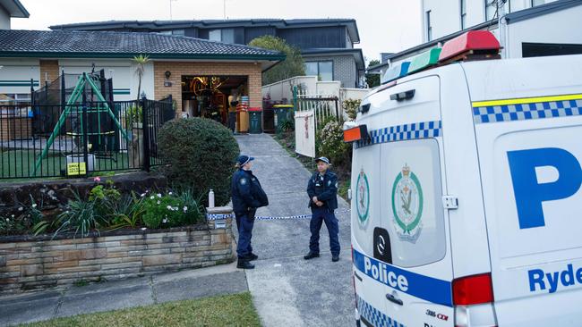 Police at Carrig’s Marsfield home in July after the bodies of his mother and sister were found. Picture: Max Mason-Hubers