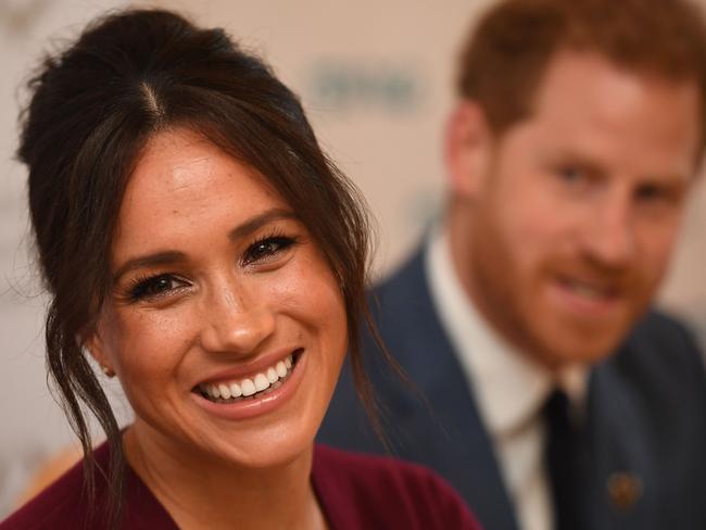 Prince Harry, Duke of Sussex and Meghan, Duchess of Sussex are all smiles as they set to break away from the Royal Family. Picture: AFP