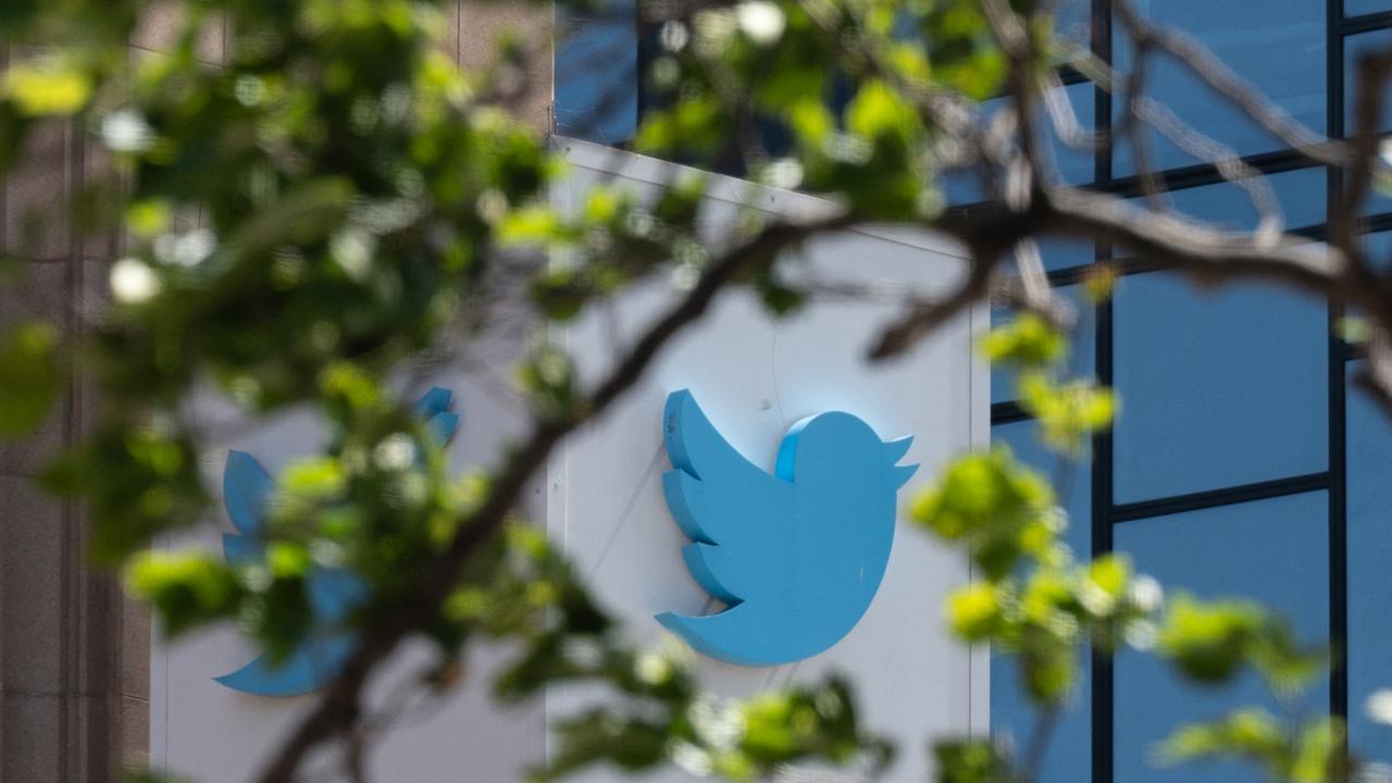 The Twitter logo is seen at their headquarters in downtown San Francisco, California. (Photo by Amy Osborne / AFP)