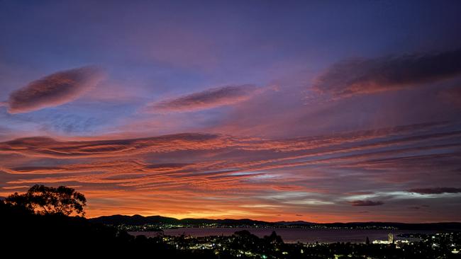 Sunrise over West Hobart. Picture: Adam Howell. Your Focus on Tasmania **ONE TIME USE ONLY**