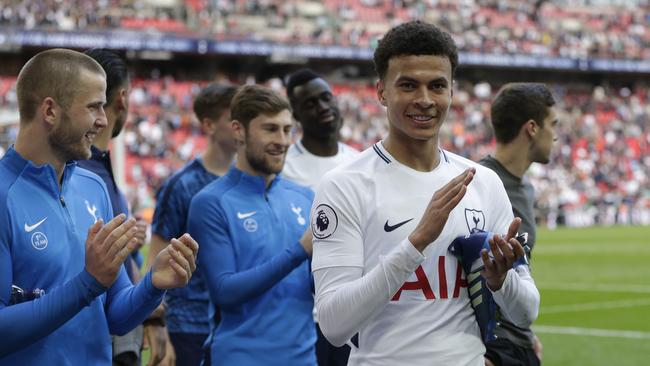 Dele Alli of Tottenham Hotspur shows appreciation to the fans.