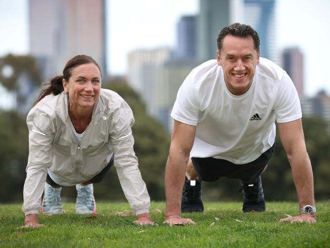 Lord mayoral candidate Anthony Koutoufides with one of his running mates, triathlon champion Emma Carney, has a plan for a Melbourne fitness army. If elected as lord mayor, he will personally run fitness classes for ratepayers across the City of Melbournes parks and gardens.                      Picture: David Caird