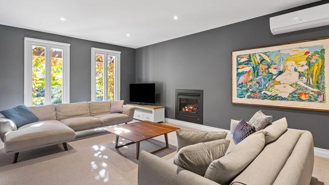 A fireplace keeps one of the living areas cosy.