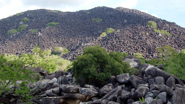 Black Mountain or Kalkajaka is a granite boulder formation 25km south of Cooktown.