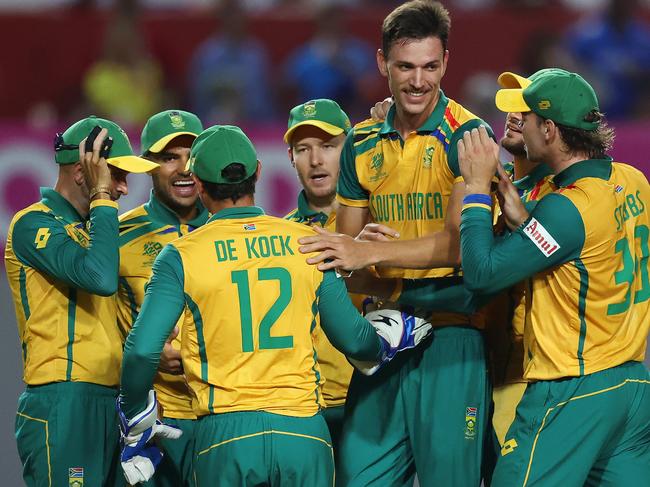 TAROUBA, TRINIDAD AND TOBAGO - JUNE 26: Marco Jansen of South Africa celebrates with teammates after dismissing Nangyal Kharoti of Afghanistan (not pictured) during the ICC Men's T20 Cricket World Cup West Indies & USA 2024 Semi-Final match between South Africa and Afghanistan at Brian Lara Cricket Academy on June 26, 2024 in Tarouba, Trinidad And Tobago. (Photo by Matthew Lewis-ICC/ICC via Getty Images)