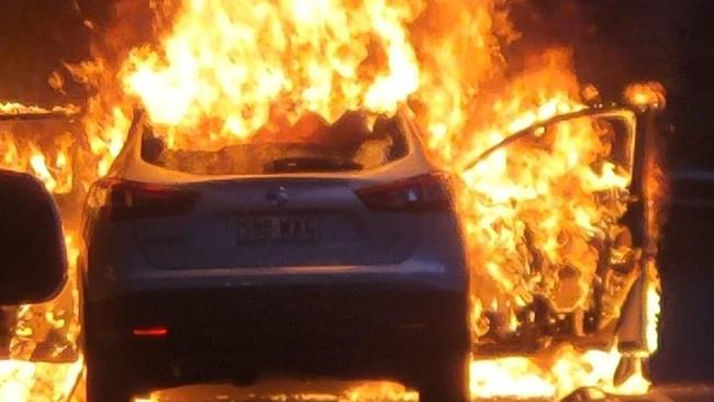 The Nissan SUV was engulfed in flames when fire crews arrived at the scene. Photo: Vi Petersen