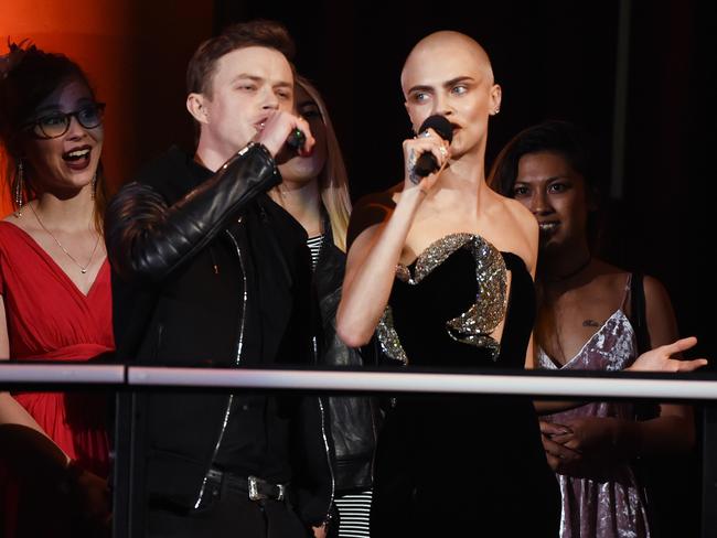Dane DeHaan and Cara Delevingne speak onstage during the 2017 MTV Movie And TV Awards at The Shrine Auditorium on May 7, 2017 in Los Angeles, California. Picture: Getty