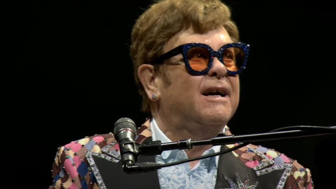 Sir Elton performs a tribute at the Shane Warne memorial this year.