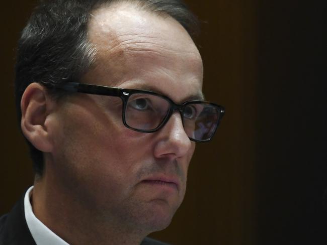 Chair of the Australian Securities and Investments Commission (ASIC) James Shipton (centre) speaks during a Parliamentary Joint Committee on Corporations and Financial Services at Parliament House in Canberra, Friday, September 13, 2019. (AAP Image/Lukas Coch) NO ARCHIVING