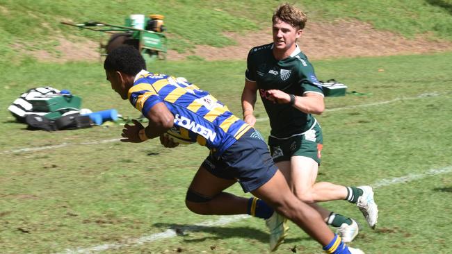 Kamisese Tuqalo goes in to score a try.