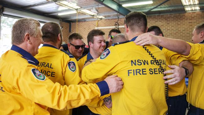 The Horsley Park brigade have a group hug. Picture: Jenny Evans