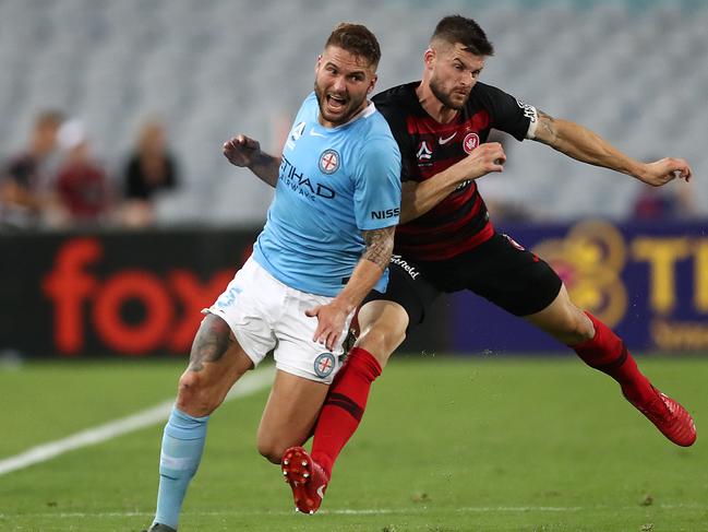 SYDNEY, AUSTRALIA - JANUARY 01: Brendan Hamill of the Wanderers fouls Bart Schenkeveld of Melbourne City during the round 10 A-League match between the Western Sydney Wanderers and Melbourne City at ANZ Stadium on January 01, 2019 in Sydney, Australia. (Photo by Mark Metcalfe/Getty Images)