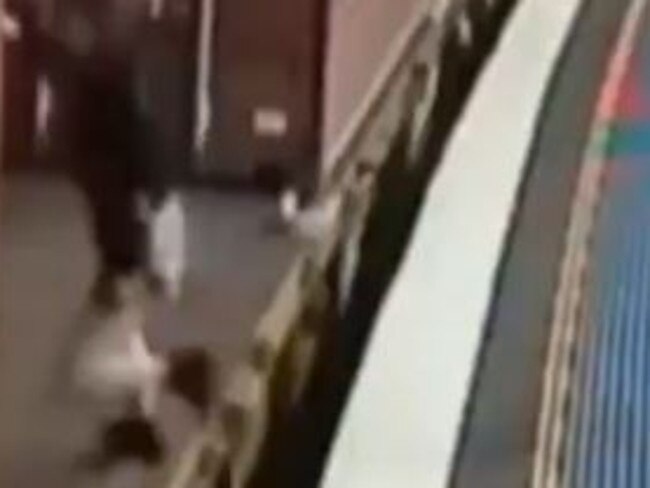 CCTV captures the girl stumbling and then falling between the gap in the carriages. Source: www.liveleak.com