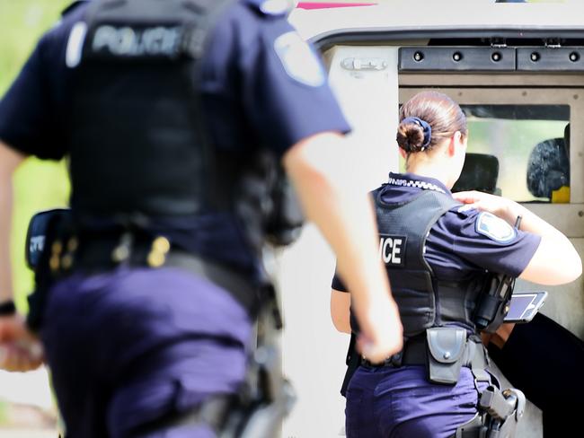 Generic picture of police arresting a man. Picture: Alix Sweeney