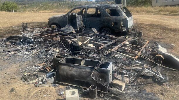 A Laidley man had been charged over his alleged involvement in a fire that destroyed a caravan and car.