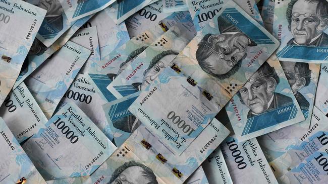 This picture of a stack of 10,000 bolívar-bills was taken in 2018, amid a hyperinflation crisis the IMF said could reach 1 million per cent. Picture: Juan Barreto/AFP