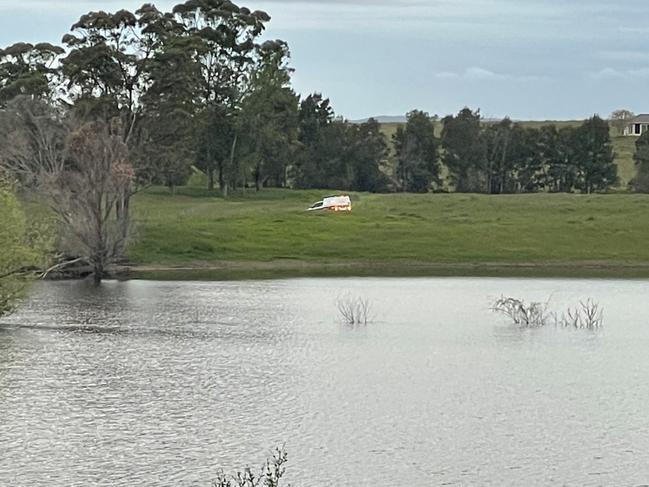 Emergency vehicles heading to the scene of the helicopter crash in Maitland Vale. Picture: Dan Proudman