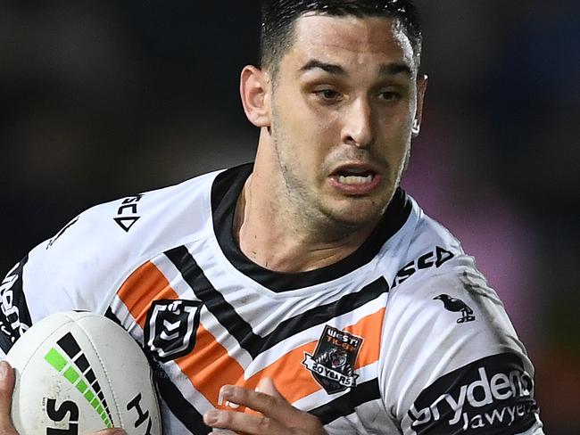 TOWNSVILLE, AUSTRALIA - JUNE 14: Ryan Matterson of the Tigers runs the ball during the round 14 NRL match between the North Queensland Cowboys and the Wests Tigers at 1300SMILES Stadium on June 14, 2019 in Townsville, Australia. (Photo by Ian Hitchcock/Getty Images)