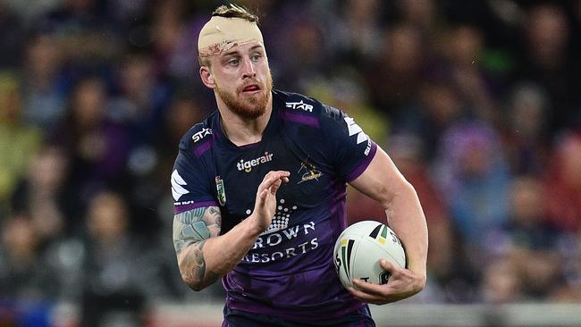 Cameron Munster of the Storm is seen in action during the NRL preliminary final between the Melbourne Storm and the Canberra Raiders at AAMI Park in Melbourne, Saturday, Sept. 24, 2016. (AAP Image/Julian Smith) NO ARCHIVING, EDITORIAL USE ONLY