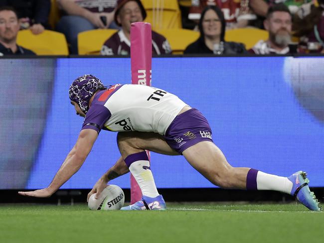 BRISBANE, AUSTRALIA - SEPTEMBER 05: Jahrome Hughes of the Storm scores a try during the round 27 NRL match between Brisbane Broncos and Melbourne Storm at Suncorp Stadium, on September 05, 2024, in Brisbane, Australia. (Photo by Russell Freeman/Getty Images)