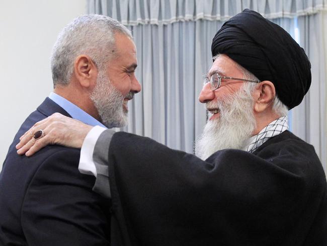 Iranian supreme leader Ayatollah Ali Khamenei, right, greets Hamas prime minister of Gaza Ismail Haniyeh, in Tehran.