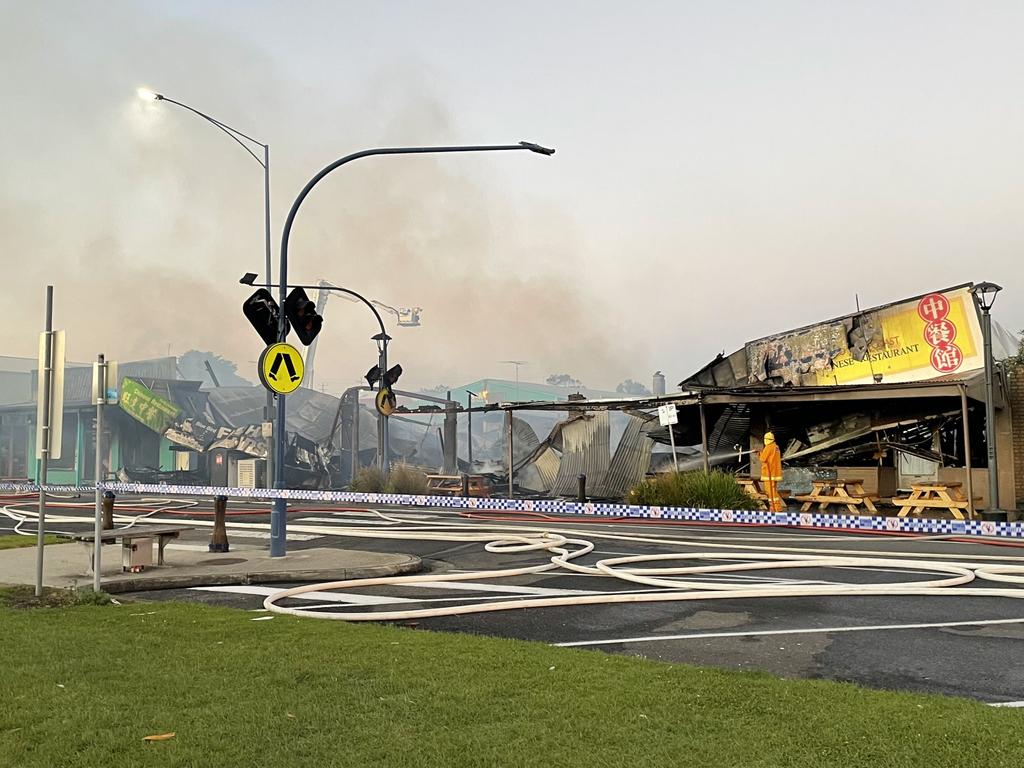 The extent of the damaged revealed as the sun rises. Picture: Sally Cannon