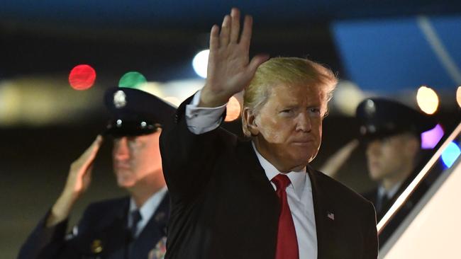 Donald Trump disembarks from Air Force One at Andrews Air Force Base in Maryland yesterday. Picture: AFP