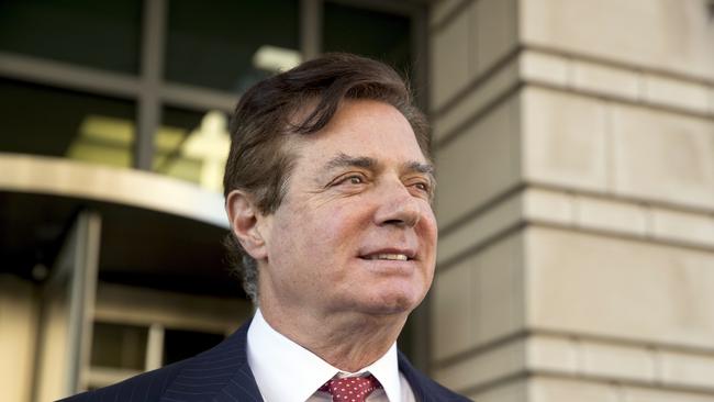 FILE - In this Thursday, Nov. 2, 2017, file photo, Paul Manafort, President Donald Trump's former campaign chairman, leaves Federal District Court, in Washington. Prosecutors working for special counsel Robert Mueller are accusing former Trump campaign chairman Paul Manafort of making several attempts to tamper with witnesses in his ongoing criminal cases. Muellerâ€™s team says in a new court filing that Manafort and one of his associates made several attempts to contact two witnesses in an effort to influence their testimony while he was on house arrest earlier this year.  (AP Photo/Andrew Harnik, File)